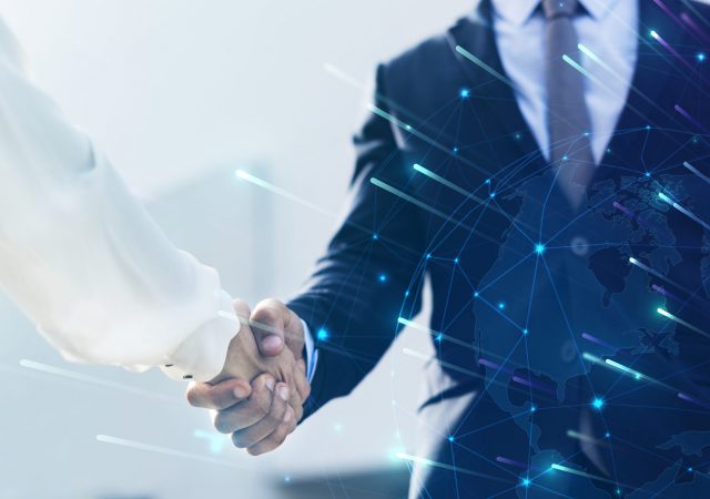 Corporate business handshake between partners